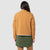 Back model shot of the sherpa jacket in natural/khaki showing the DWR tech fabric