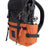 3/4 Front Detail Shot of the Topo Designs Rover Pack Classic in Black/Clay showing a Nalgene in the collapsible water bottle pocket on the side.