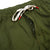 Detail shot of Topo Designs Men's Dirt Pants in Olive green showing button fly and drawstring waistband.