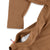 Side zipper pockets on the Topo Designs Men's Global Shirt long sleeve lightweight travel snap shirt in dark khaki brown