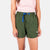 Close-up front model shot of Topo Designs Women's River Shorts in Olive green.