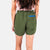 Close-up back model shot of Topo Designs Women's River Shorts in Olive green.